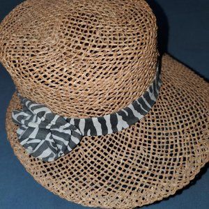 Straw hat, with animal zebra print band.